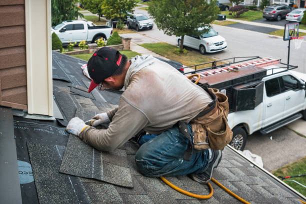 Professional Roofing technician working in Central Village, CT
